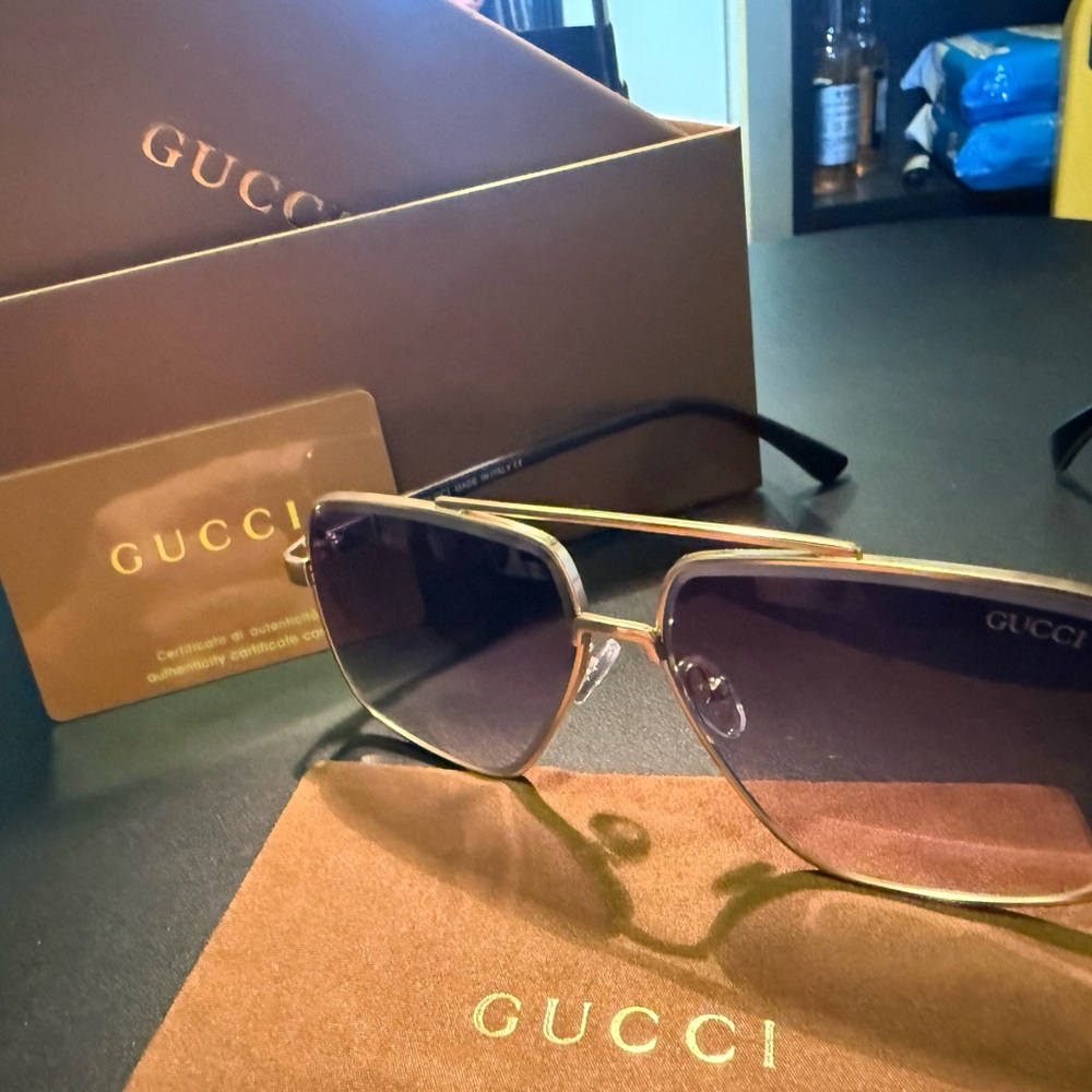 Gucci Gold and Black Sunglasses